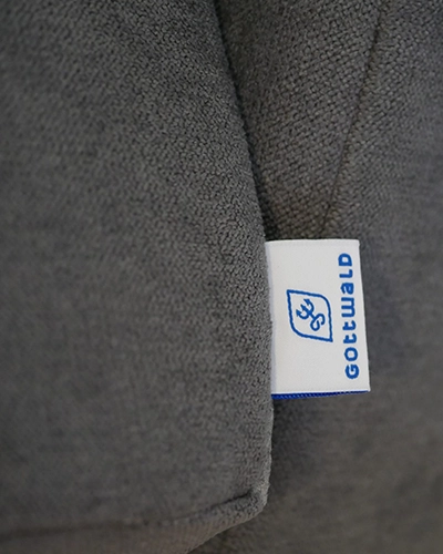 Polster mit Nahtfahne im Polsterstoff grau